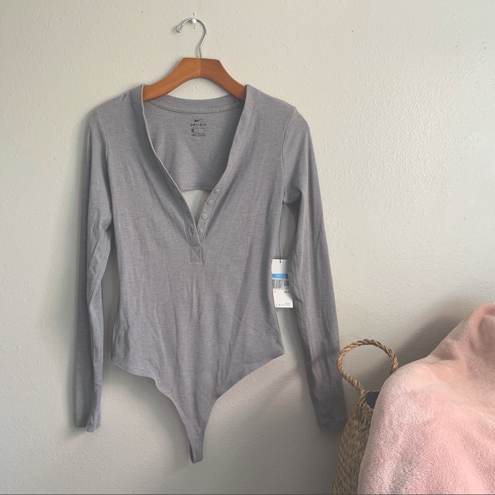 Nike | Luxe Henley Long Sleeve Bodysuit